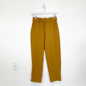 LULULEMON On the Fly 7/8 Pants 25” Inseam in a Goldenrod Marigold Color SIZE 4
